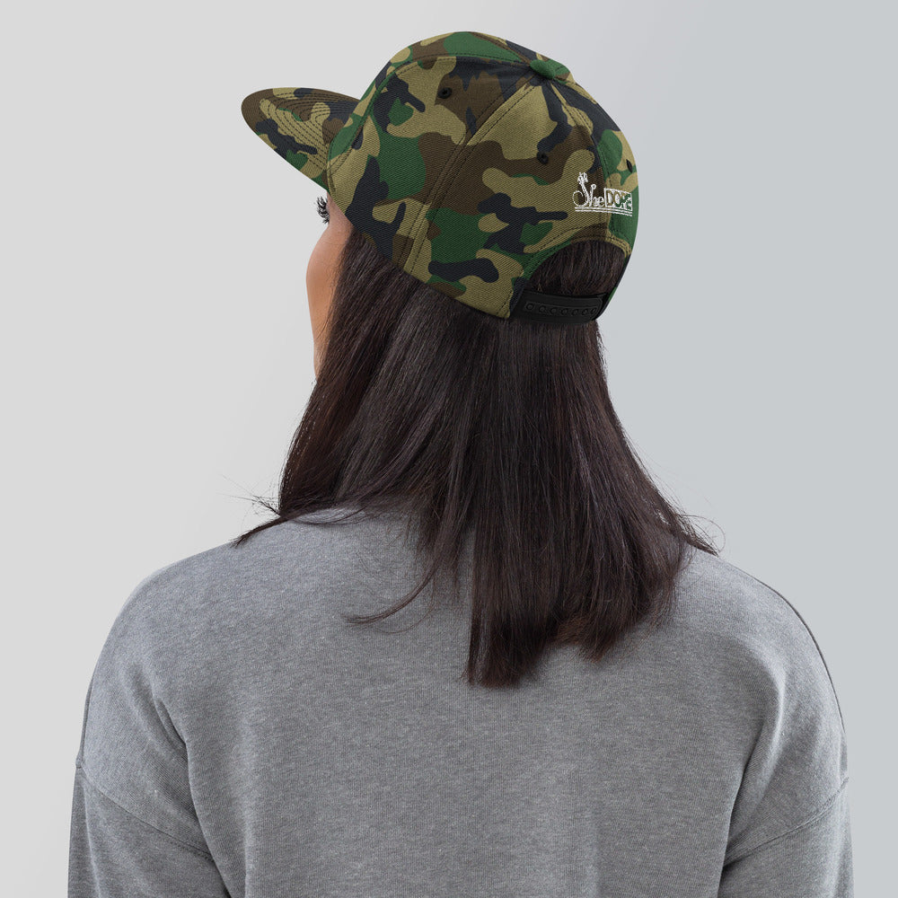 SheDope in White Snapback Hat