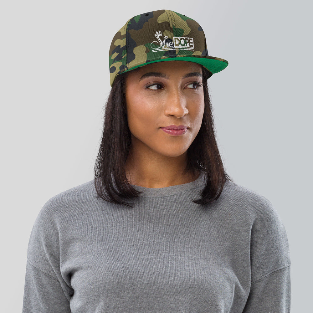 SheDope in White Snapback Hat