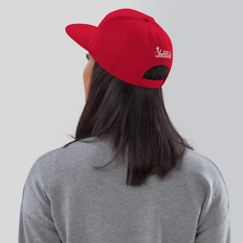 SheDope in White Snapback Hat