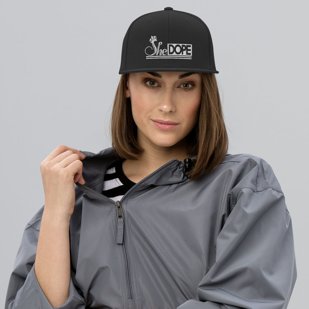 SheDope in White Snapback Hat