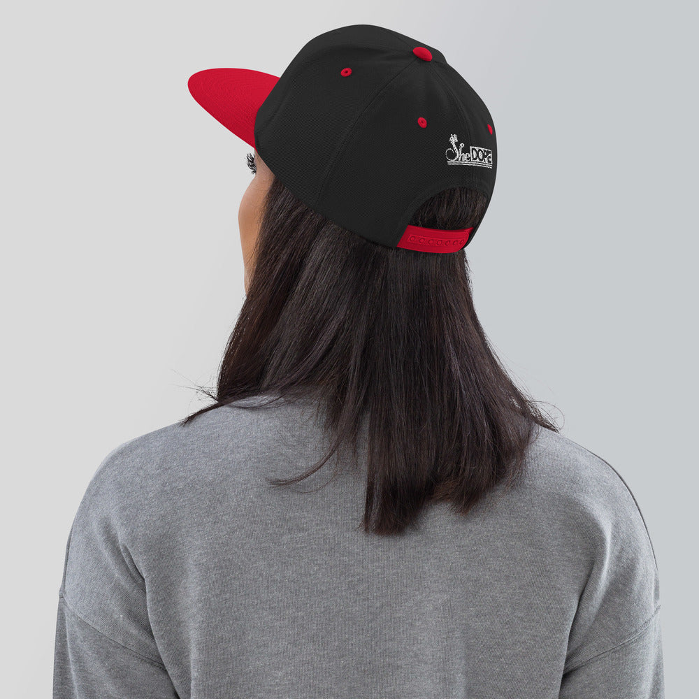 SheDope in White Snapback Hat