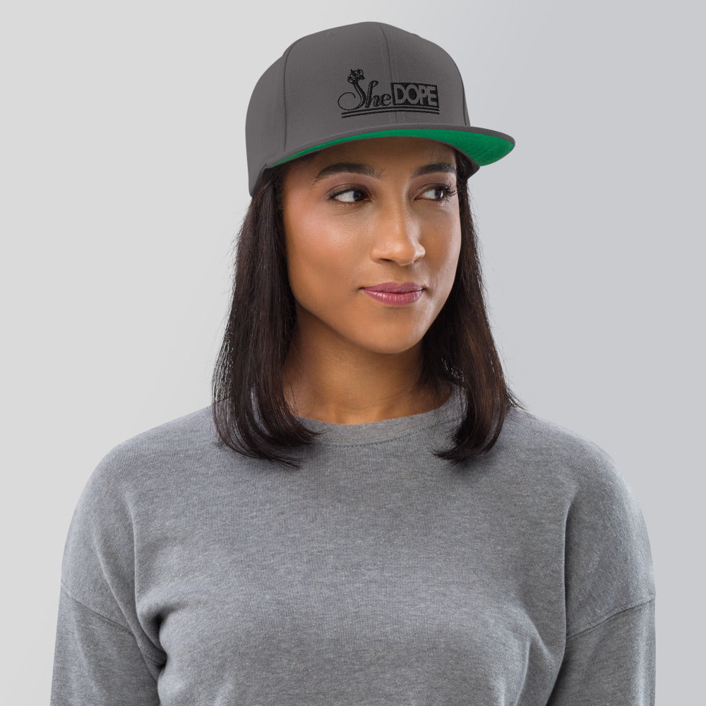 SheDope in Black Snapback Hat